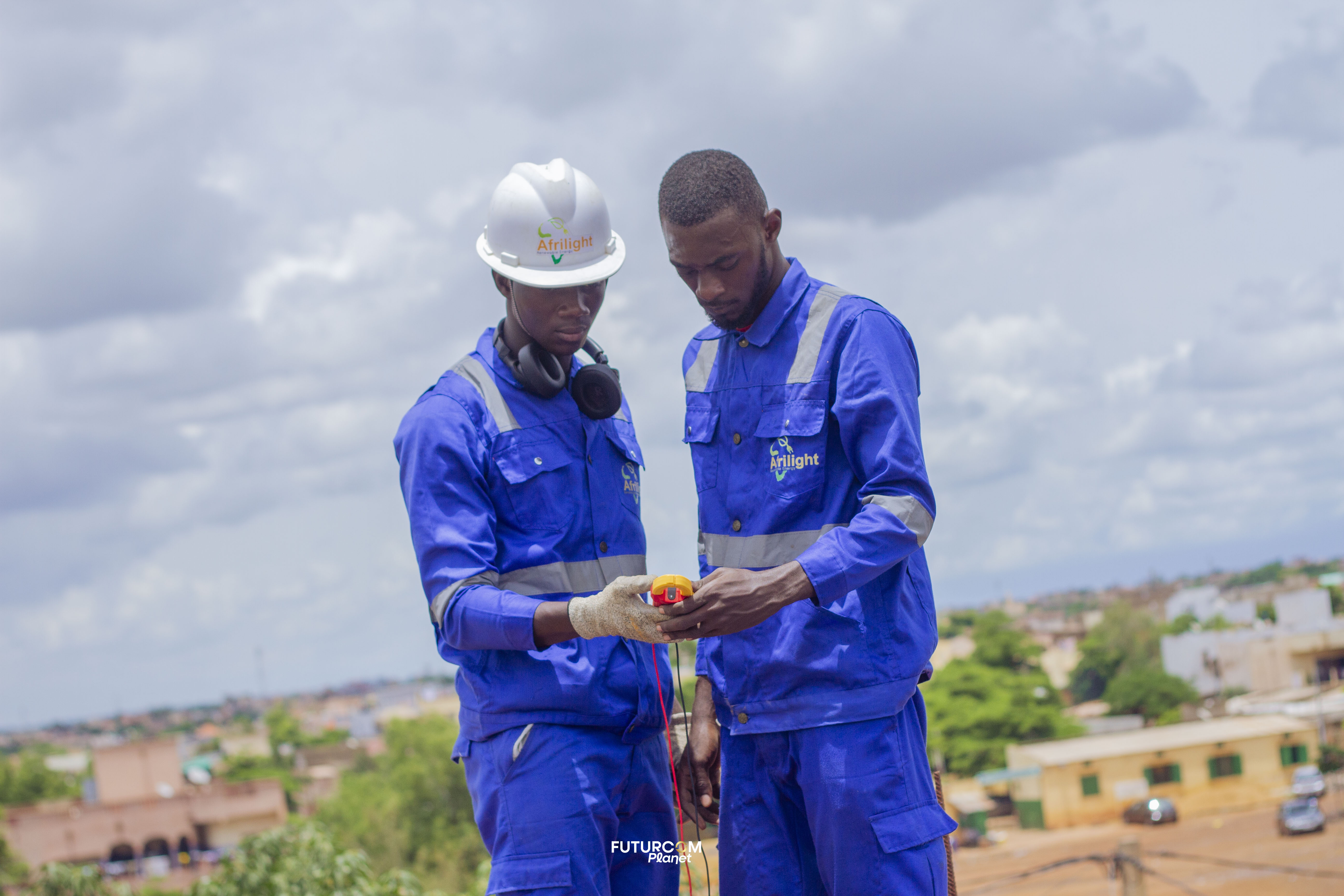 Our team working together on a solar installation